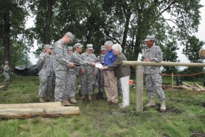 Gene and JoAnn Goodale of Pekin, Illinois, visit with military personnel at  the construction site of the Goodale-Renz ROTC Confidence Obstacle Course on June 14. The obstacle course was constructed by the 153rd Engineer Battalion of Huron, South Dakota, and the 424th Engineer Company of the Vermont Army Reserve. The Goodales, both SDSU graduates, are funding the ROTC course in honor of their familyâ€™s U.S. military service.