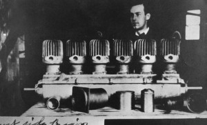 Stephen Briggs with the engine he created in 1906 while a student at South Dakota State.