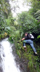 Engineering student Eduardo Torres tracks water lines through the jungle as part of an Engineers Without Borders project in Bolivia.