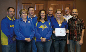 The Pride of the Dakotas Alumni Chapter is governed by a nine-member board of directors. They are, from left, Steve Johnson, Paula Derickson, Dave Jones, Steph Broderson, Mike Uken, Jen Cady (president), Jesse Miller and Dan Carlson. Not pictured is Kevin Kessler.