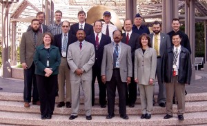 Niva, back row, fourth from left, poses with other members of the 2004 National Team-Threat Functional Working Group.