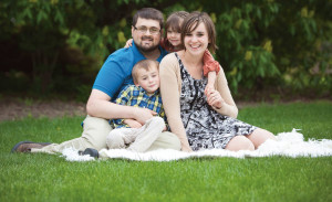The Hockhausens â€” Adam, Kirstin, Joseph, now 6, and Ariana, now 4 1/2 â€” pose for a family photo in McCrory Gardens in May 2015. Despite children, tragedy and disease, the young couple earned their degrees from State thanks in part to online education.
