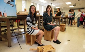 Grey Waletich, right, sits on a Flexnest with Vanny Cahyadi, her studio project partner, after working on that project at State.