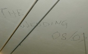 The Hiseks wrote their wedding date on a wall inside the theater.