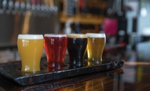 A sample platter of four beers.