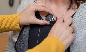 Person holding a stethoscope