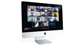 A computer with several individual photos of people in a Zoom room.