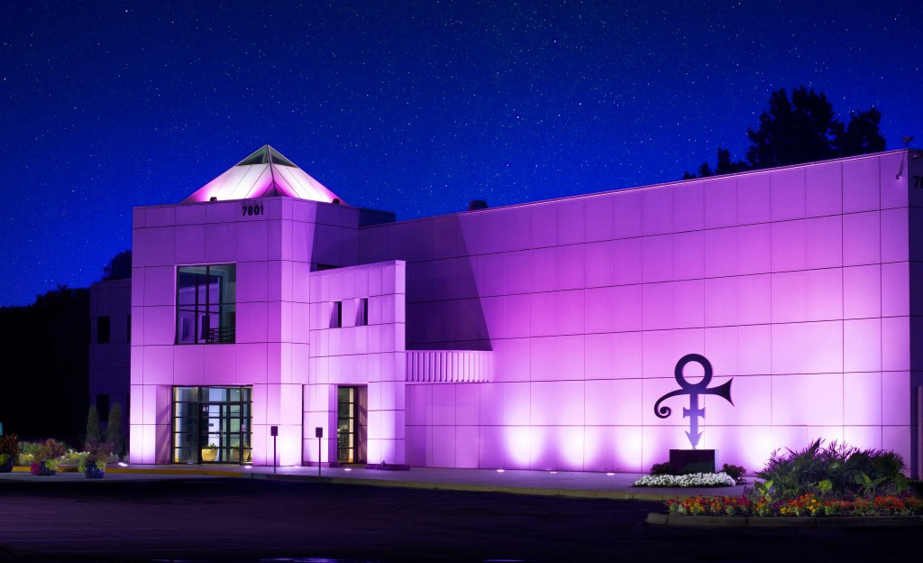 Paisley Park, the former home and production area for Prince is lit up in purple.