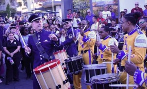 A military drummer jams with a high school band.