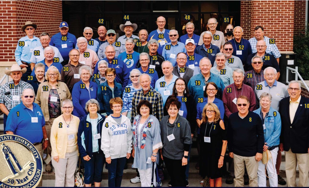 50 members of the Classes of 1970 and 1971 gather for a group photo.