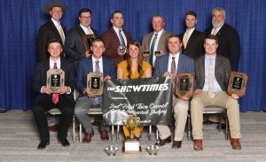 The livestock judging team poses for a team photo with their trophies.