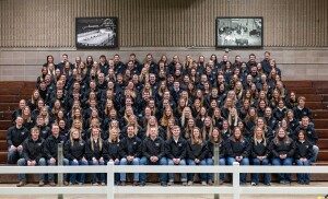 A large group of college students all wearing the same black shirt to show they volunteered for Little I.